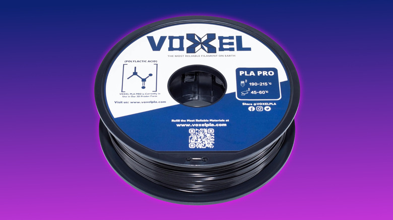 Black VOXEL PLA+ black filament on a purple gradient background