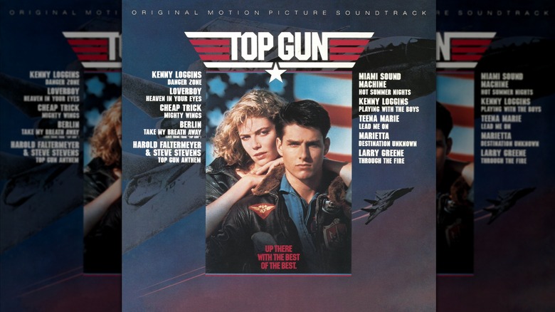 The front cover to the "Top Gun" original motion picture soundtrack, showing the tracklisting of songs as well as a photo of Tom Cruise and Kelly McGillis
