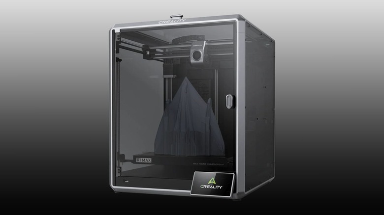 Angled profile of Creality K1 Max AI printing out a model of a stealth fighter jet