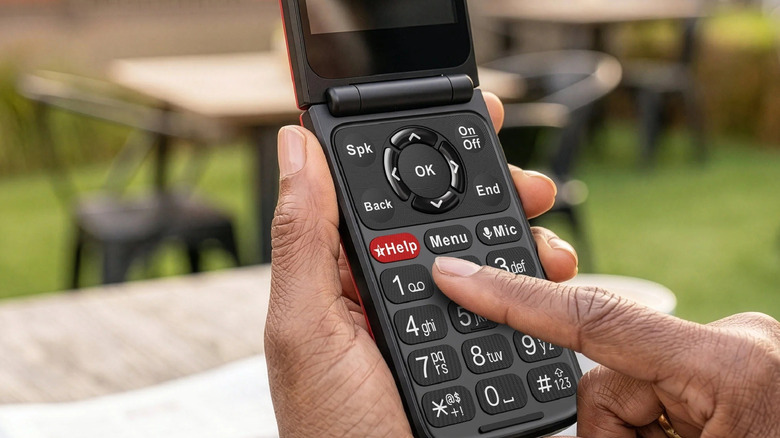 Person holding a Jitterbug Flip 3 phone