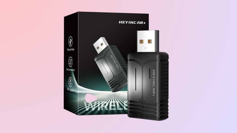 HEYINCAR+ H-Air wireless adapter against a gradient background