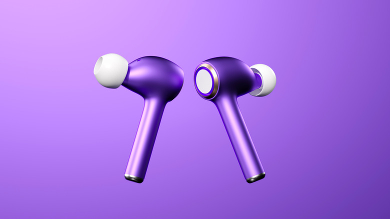Metallic purple earbuds on a purple background