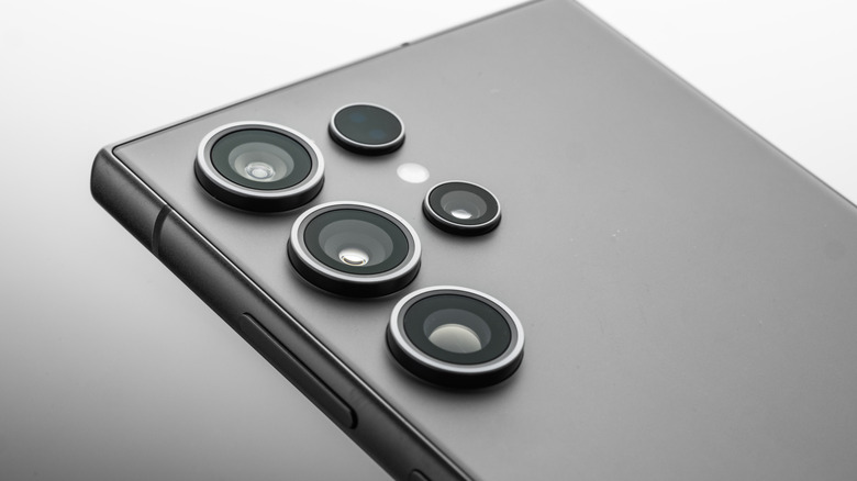 A closeup showing a Samsung Galaxy S series phone from the back