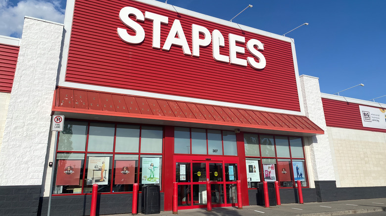The main entrance of a Staples store with signage