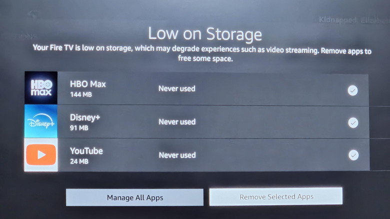 A screenshot of Amazon Fire TV showing a Low on Storage error message which lists out apps that have never been used before