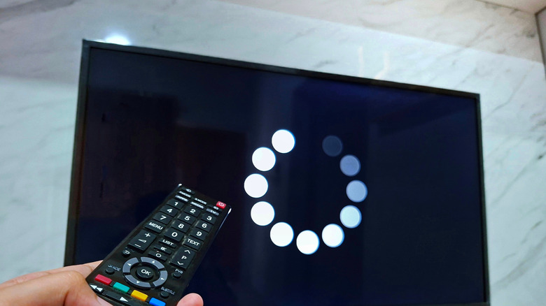 TV showing a loading icon