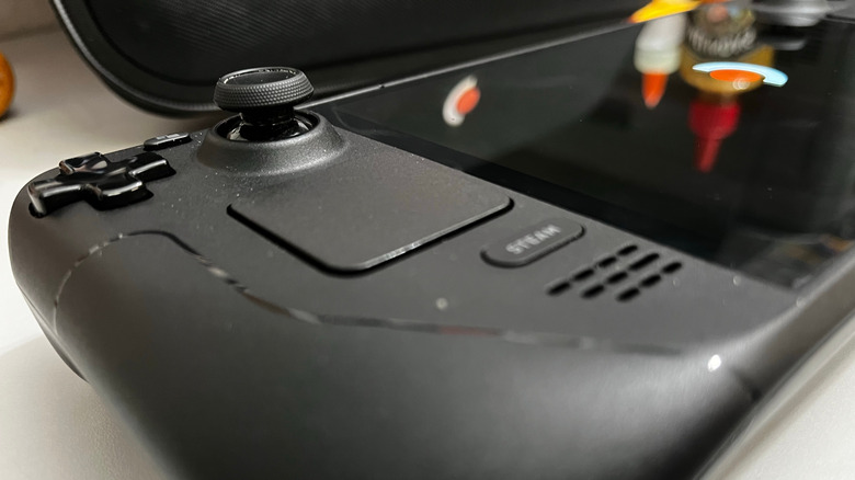 Side view of a Steam Deck in the midst of booting up.