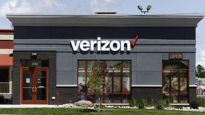 The entry of a Verizon store in a suburban area.