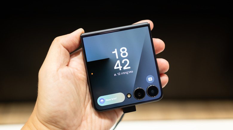 A person holding the Z Flip 7