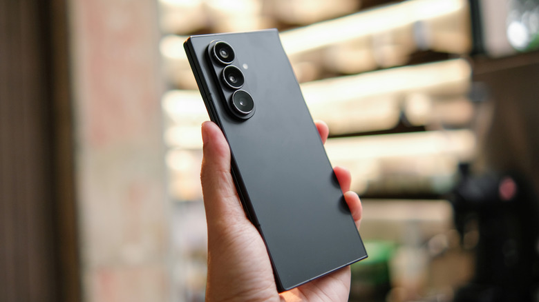A person holding the Galaxy Z Fold 7