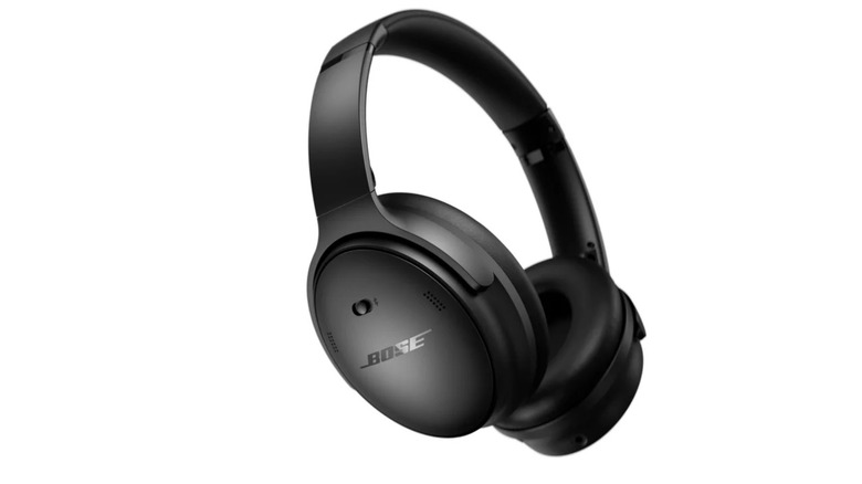 Bose QuietComfort headphones in black facing sideways on a white background