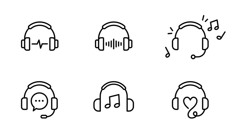 Person sitting in front of laptop while wearing AKG N9 Hybrid