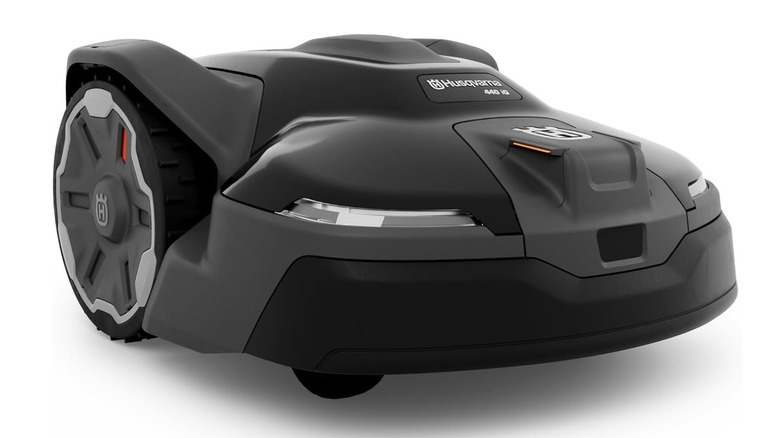 The Husqvarna 440iQ robot lawn mower on a white background.