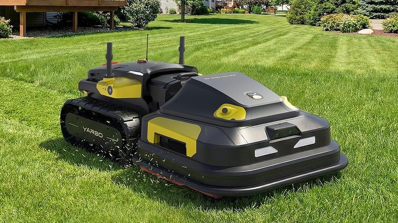 The Yarbo Pro robot lawn mower, cutting grass.