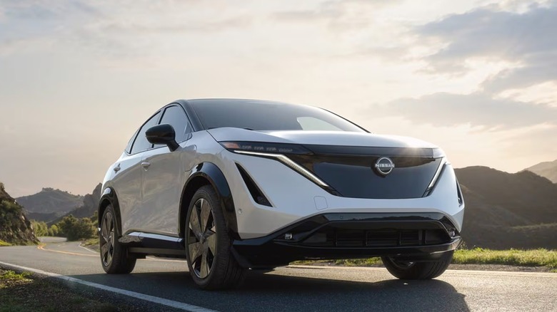 The 2026 Nissan Ariya parked on a road.