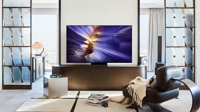 The Samsung S90F OLED placed in a living room