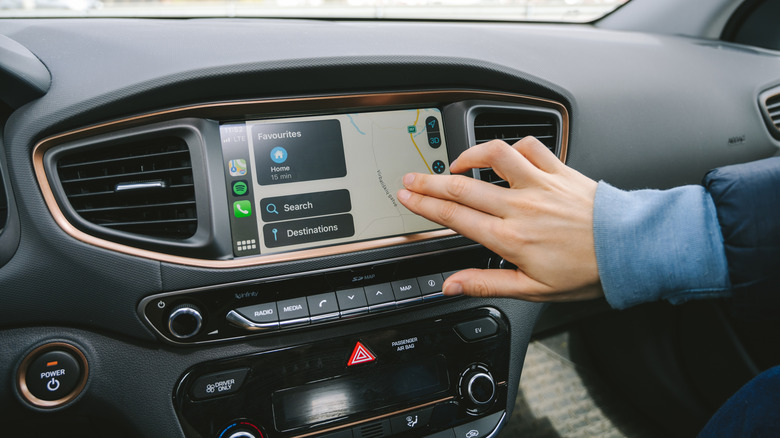 Digital screen inside Hyundai Ioniq Electric car interior with Apple CarPlay system
