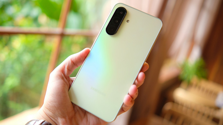 Holding the Samsung Galaxy A36