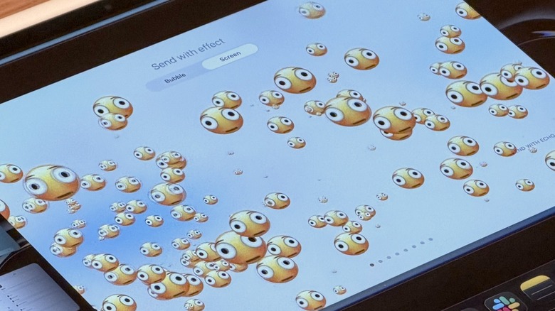 Up-close shot of the new Distorted Face emoji on an iPad Pro
