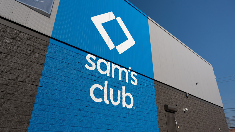 The Sam's Club logo on the side of a physical store.