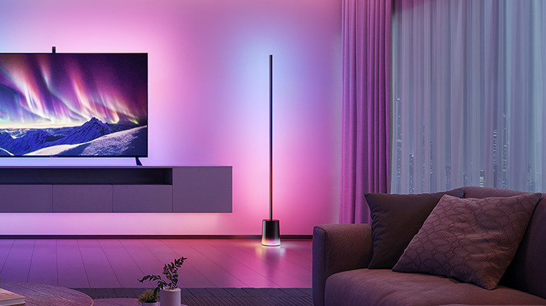 The Govee Floor Lamp 2 in a living room, beside a TV.