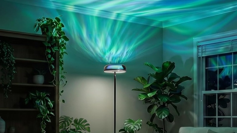 The Govee Uplighter Floor Lamp with its dynamic ripple lighting on the ceiling of a living room.