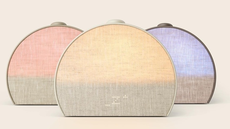 The Hatch Restore 3 sunrise alarm clock in various light modes.