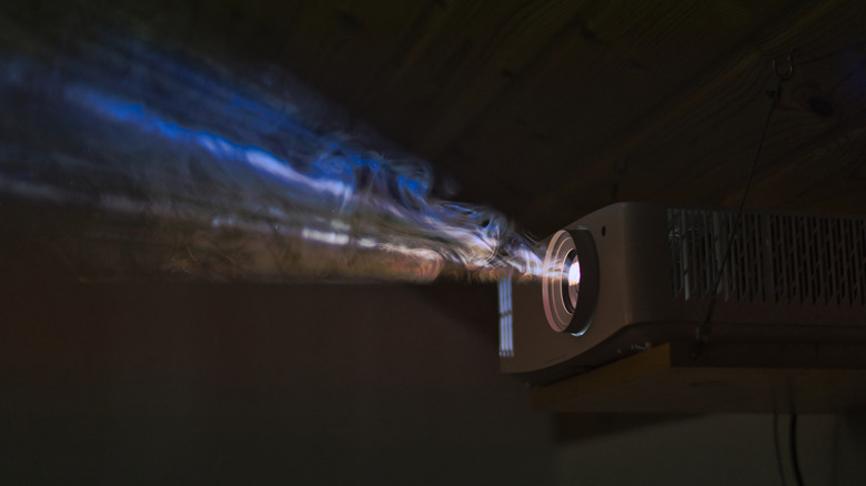 Colorful projector beam through smoke