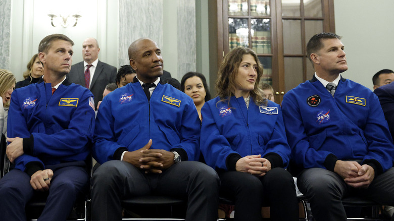 Artemis II astronauts in a meeting