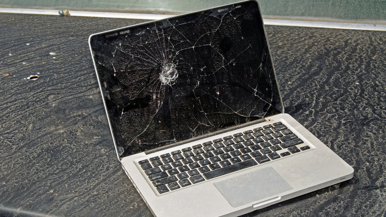 A MacBook with broken screen