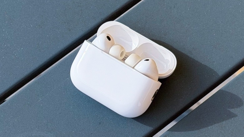AirPods Pro 3 inside the charging case on a table