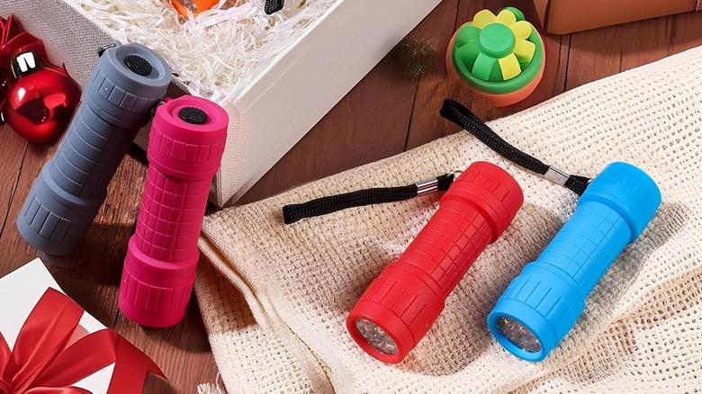 Four EverBrite 9-LED Flashlights on table