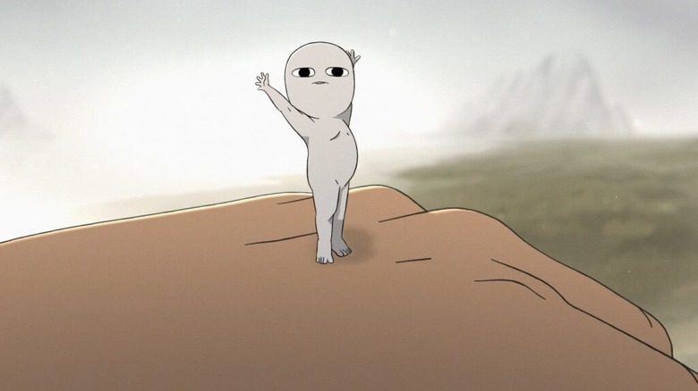 One of the little kodama-like little guys stretching on someone's hand