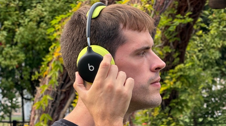 Man using Beats 360 headphones