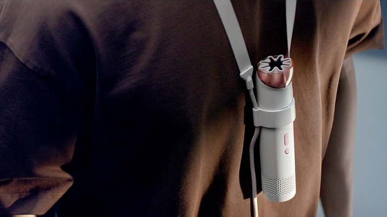 Dyson HushJet Mini Cool personal evaporative cooling device worn around neck.