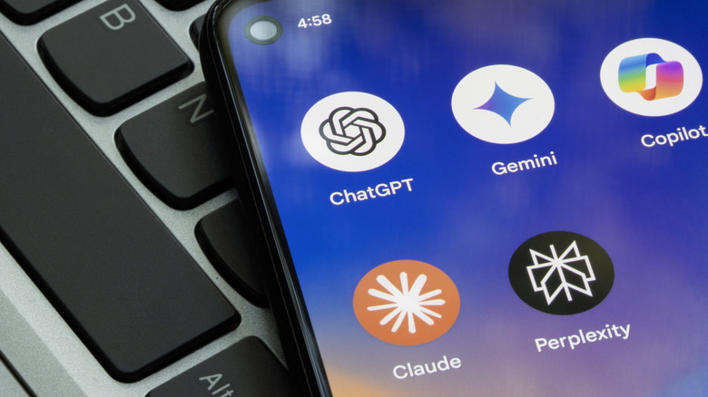 AI chatbot apps on a phone screen on top of a keyboard