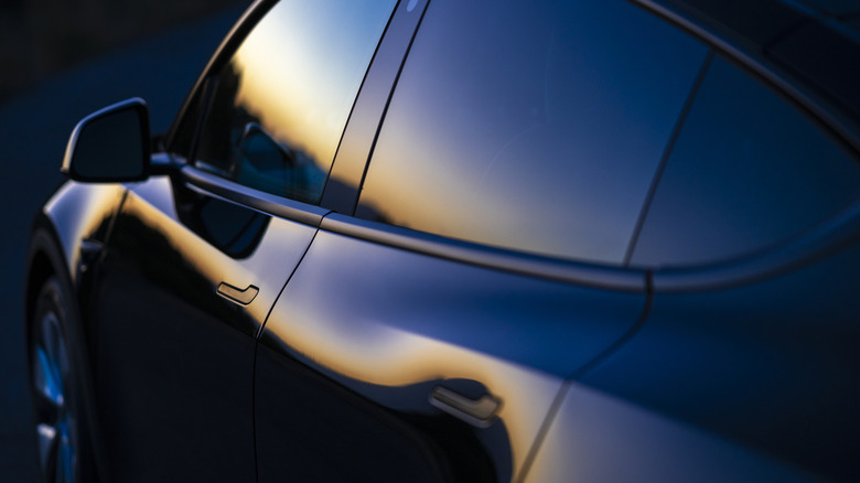 Side view of a car on the road.