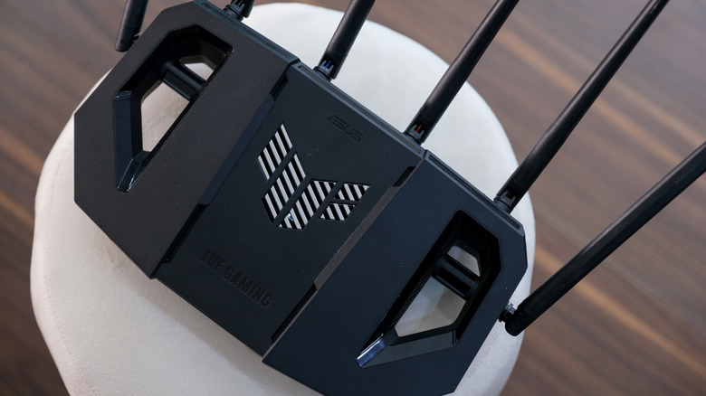 a top up view of an Asus gaming router with Wi-Fi 7 on a table