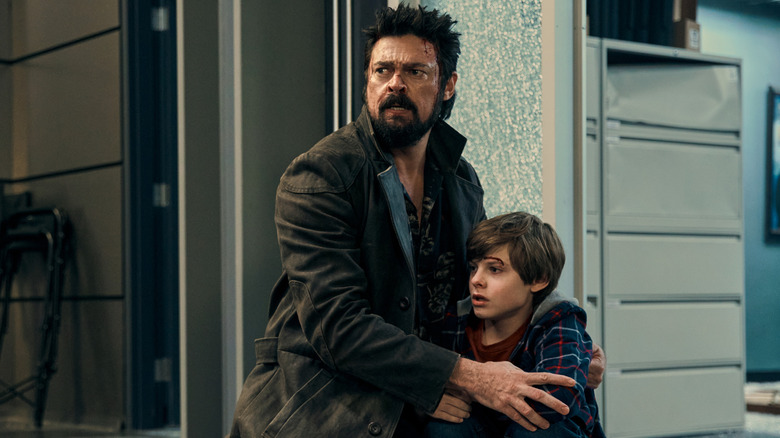 Billy Butcher (Karl Urban) holding Ryan Butcher (Cameron Crovetti) in The Boys