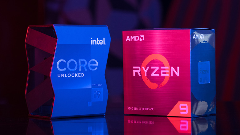 Boxes for an Intel Core CPU and an AMD Ryzen CPU sitting side by side in dramatic blue and red lighting.