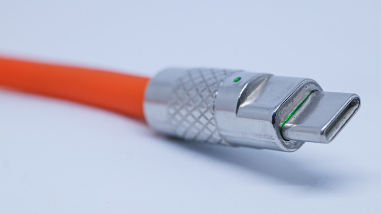 A photograph of a USB Type-C cable on a white background.
