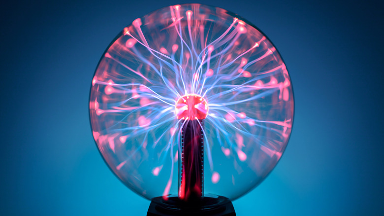 A desktop plasma ball generating sparks.