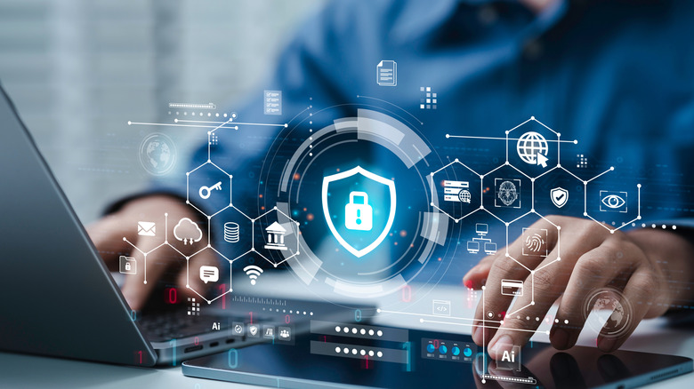 Image of a person using a laptop with overlaid graphics