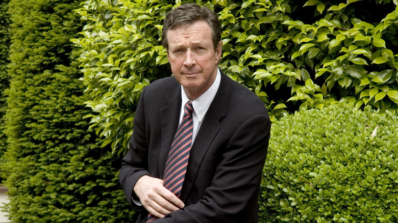 Michael Crichton posing in Milan, Italy.