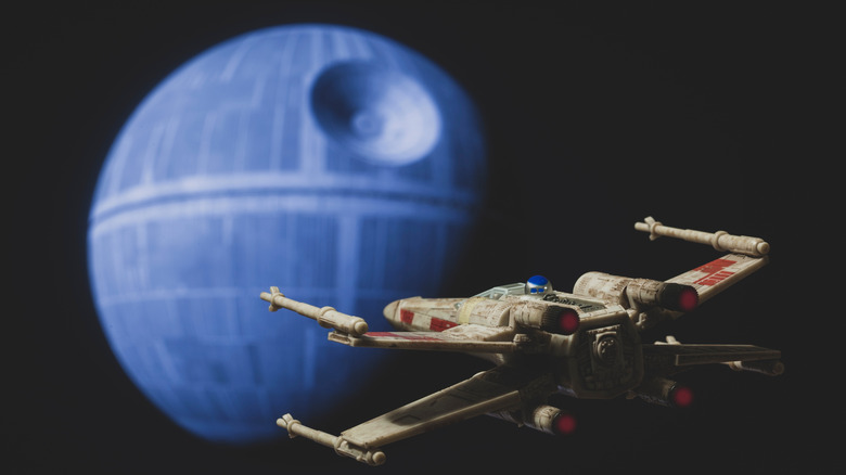 A recreation of a Star Wars X-Wing flying toward the Death Star.
