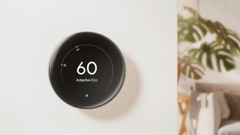 The Google Nest Learning Thermostat 4th Gen model mounted to a wall.