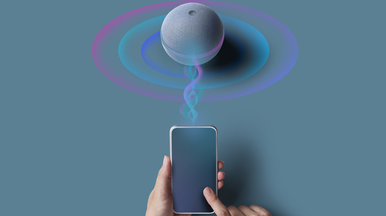 A graphic of a phone being used to connect to a Bluetooth speaker.