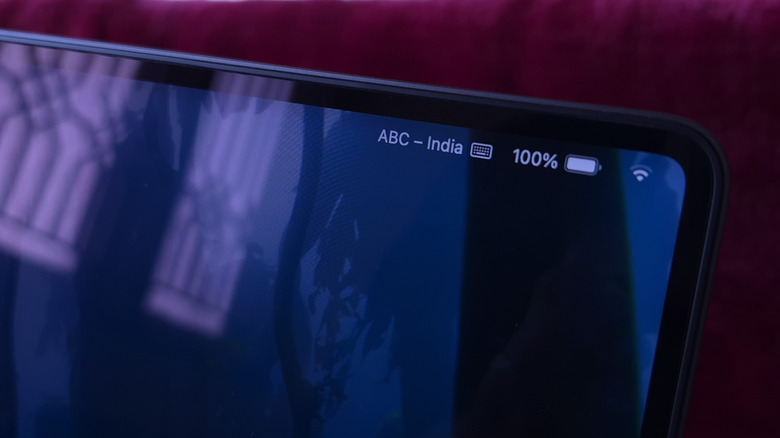 A closeup of a Mac screen's menu bar showing the battery icon in focus