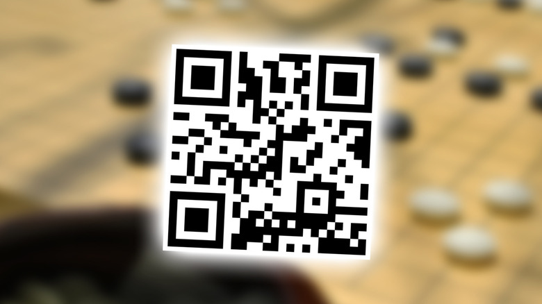 Go game blurred with a QR code overlayed that points to BGR.com