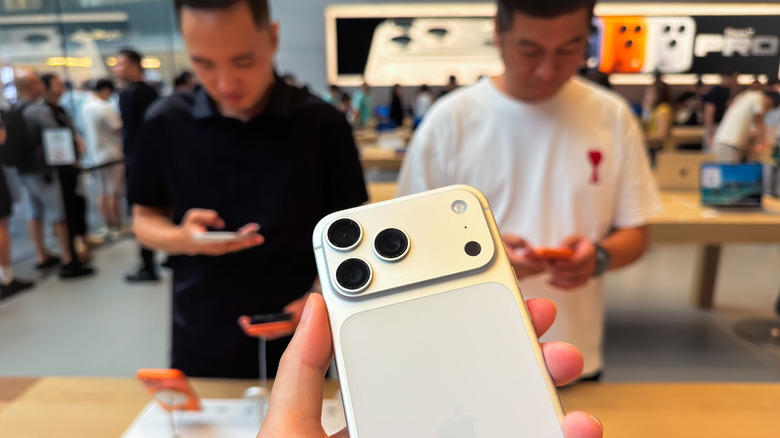The iPhone 17 Pro's camera plateau and antenna lines on the sides.
